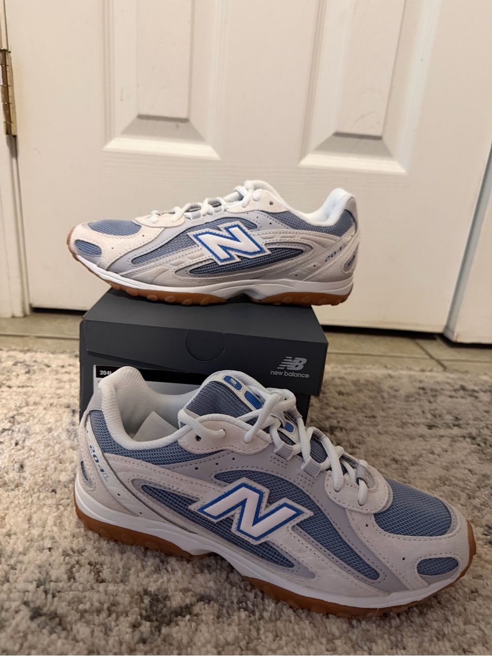 New Balance 204L  White and Blue Athletic Sneakers with Gum Outsole